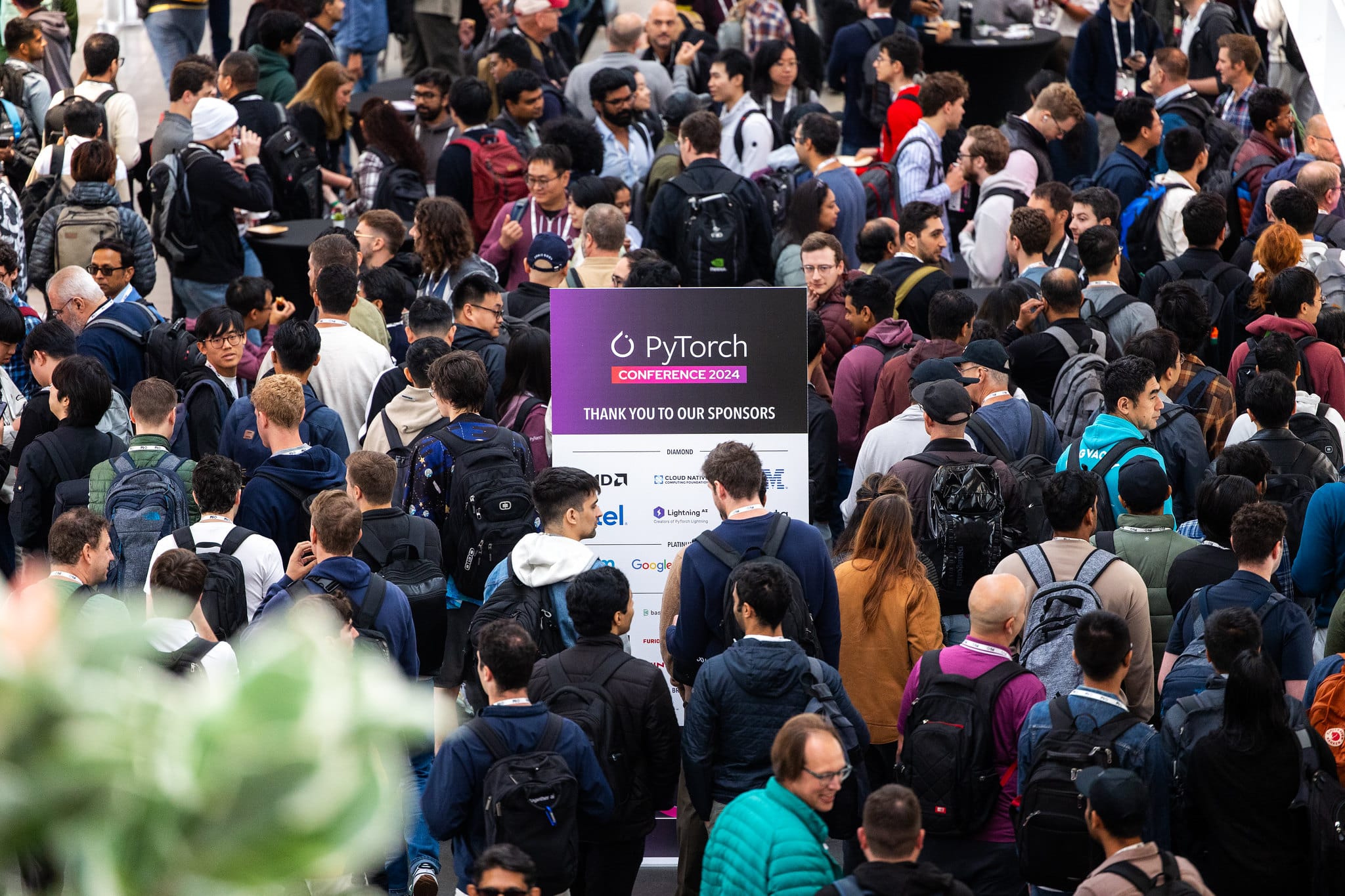 A crowd of people at a conference